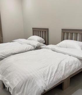 Almajaridah Apartment | غرفة نوم بسريرين مفرده
