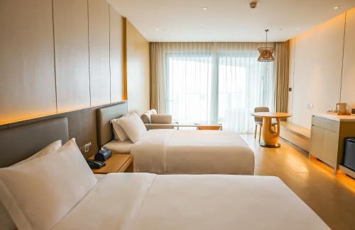 Tianya District Hotel | 三亚天成中央海岸海景酒店