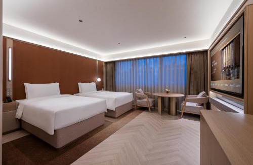 Jiang'an District Hotel | 武汉汉口金融中心万象城桔子水晶酒店