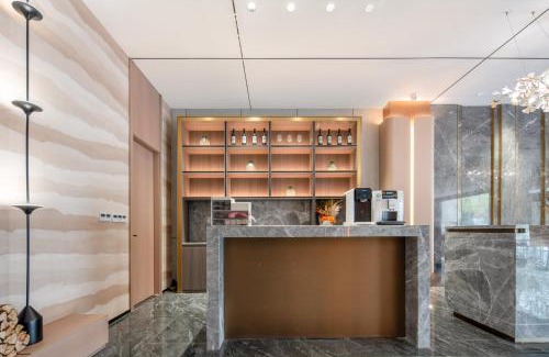 Zhongyuan District Hotel | 沃德酒店郑州大学高新校区店