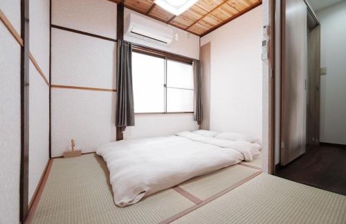 Konohana Villa | 西九条駅徒歩3分USJと梅田と関空直通丸々貸切一軒家koto別館