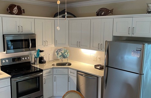 Wheeland Settlement Condo | 1 bdrm second floor , views pool hot tub private beach spacious newly renovated