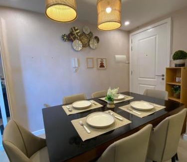 San Fernando Apartment | 1-BR Condo with 4 BEDS, DINING, Karaoke,NETFLIX,YTpremium,GAMES,WIFI,25TH fLoor - Sunrise & Sunset CITY&POOL view , wrap-around BALCONY