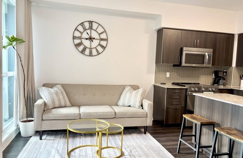 Rexdale Condo | 1BR+Den Near YYZ with Workspace