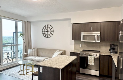 Rexdale Condo | 1BR+Den Near YYZ with Workspace