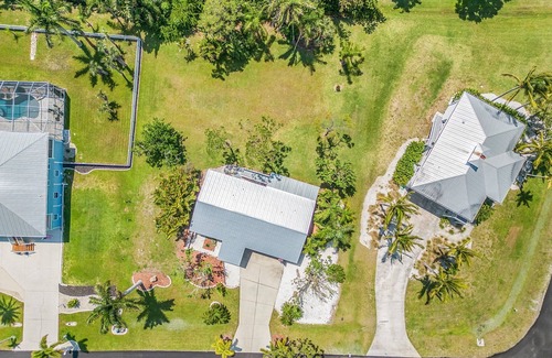 Pine Island Center House | 2/2 Heart of Pine Island Home, with Wrap Around Porch!