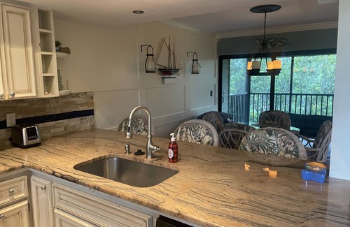Bokeelia House | 2 bed/2.5 bath Waterfront Condo with 2 pools and great fishing