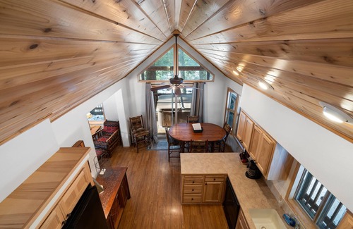 Historic Downtown District Cabin | 2 bedroom cabin plus loft, huge deck, lodge-style furnishings.