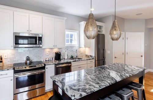 Fifth Ward Condo | 2 Decks for Entertaining, Walk To Town and Harbor
