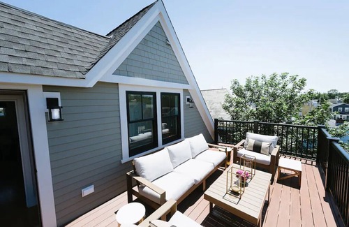 Fifth Ward Condo | 2 Decks for Entertaining, Walk To Town and Harbor