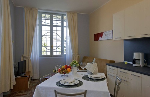 Carciano Apartment | 2-room apartment with terrace and garden in an Art Nouveau villa with communal pool