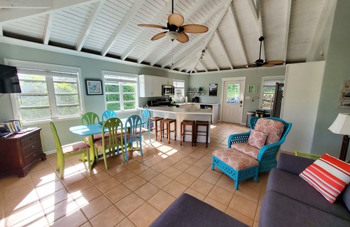 Lower Carolina Villa | 20% off! Charming cottage -water view, hot tub, outdoor shower, battery backup!