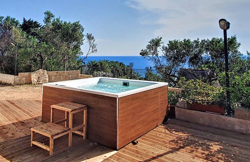 Marina di Felloniche Cottage | 250m from beach: renovated stone house w/jacuzzi