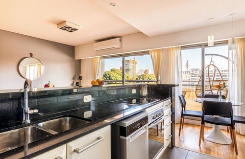 Buenos Aires Central Business District Condo | 2BR Family Apt Puente de la Mujer View