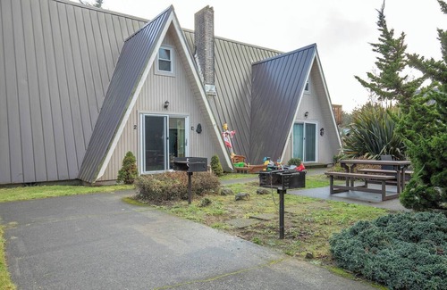Ocean Shores Villa | 2BR Medieval Beach Villa - Walk to Beach - Pet-Friendly, Sleeps 7