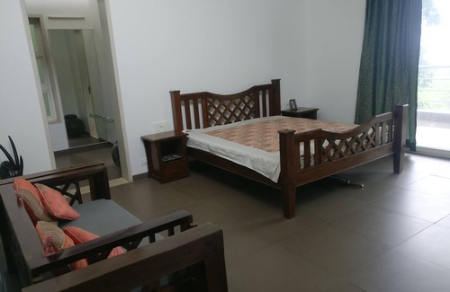 Kune N.m. Villa | 3 bedroom Villa with Swimming pool, Lawns, Games Den and a Disco.