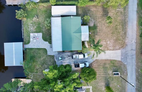 Crescent City House | 3 BR 2 BA House w/Dock on Deep Canal in Bass Capital