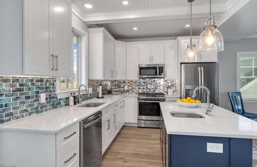Admiral Estates House | 3 levels with 5 bedrooms, 4.5 baths, elevator, heated pool, and lots of gathering spaces both inside and out!