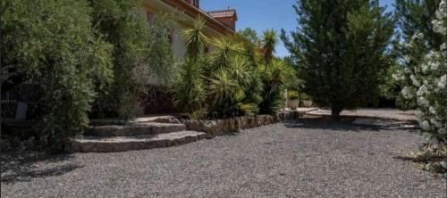 Monistrol de Montserrat Apartment | 3-Story Gaudi Building with Montserrat Stone