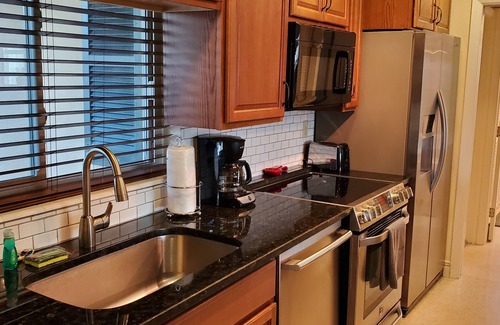 Pelican House | 4 Bedroom 3 bath Canal, South facing Pool home,