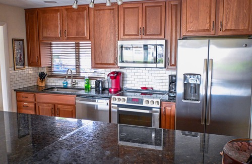 Pelican House | 4 Bedroom 3 bath Canal, South facing Pool home,