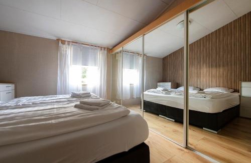 Oisterwijk Ski Chalet | 79, Ruime chalet aan de Kampina