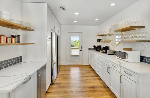 St. George Island House | 9 BR 7.5 BA Gulf Coast Beachfront Paradise with Private Pool and Dock-Sleeps 20+