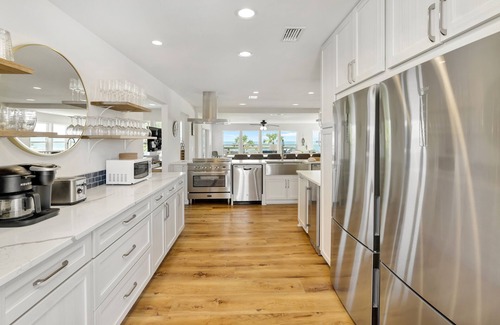 St. George Island House | 9 BR 7.5 BA Gulf Coast Beachfront Paradise with Private Pool and Dock-Sleeps 20+