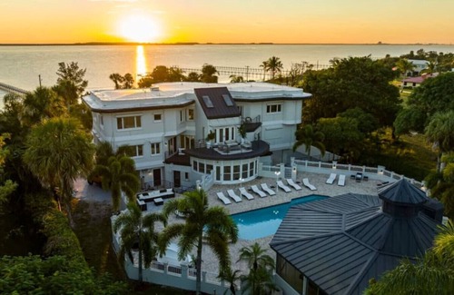 Fort Pierce Villa | 9K SF Waterfront Mansion, Pool, Boat Dock, Theater