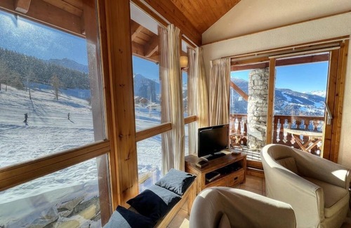Vallandry Ski Chalet | A 10 person chalet directly on the piste with panoramic views