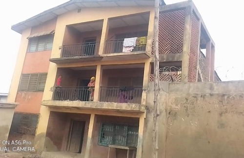 Ibadan Apartment | A 2-story building with 2 shops