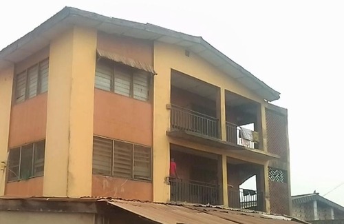 Ibadan Apartment | A 2-story building with 2 shops