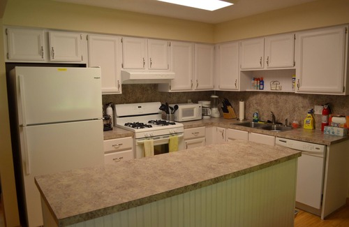 Holland House | A block from the beach! A beautiful wooded spot a 5 minute walk from Lake MI.
