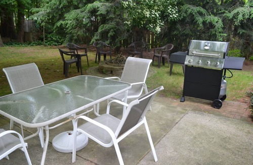 Holland House | A block from the beach! A beautiful wooded spot a 5 minute walk from Lake MI.