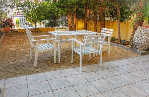 Voula Apartment | A lovely ground floor apartment with a backyard patio