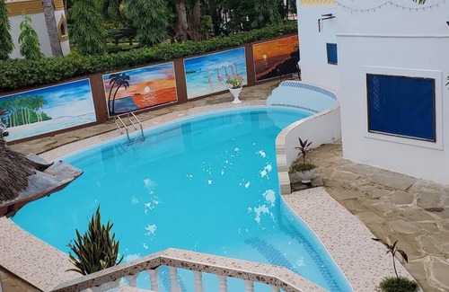 Galu Beach Hotel | A Sentimental Villa With a Swimmingpool Near Beach