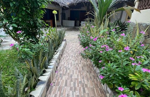 Galu Beach Hotel | A Sentimental Villa With a Swimmingpool Near Beach