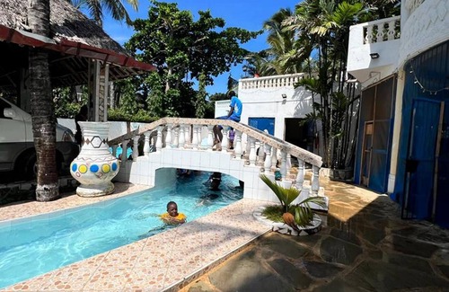 Galu Beach Hotel | A Sentimental Villa With a Swimmingpool Near Beach