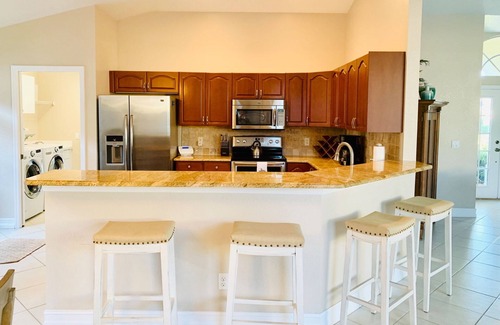Central Naples House | A true gem in Briarwood we call Seven Palms,a 3 bed, 2 bath private pool home