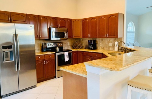 Central Naples House | A true gem in Briarwood we call Seven Palms,a 3 bed, 2 bath private pool home