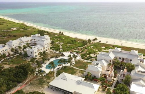 Wheeland Settlement Condo | A TRUE OCEAN FRONT view from couch & kitchen ground floor 2 patios quiet corner