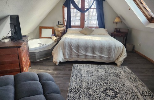 Burt Cabin | A warm relaxing couples retreat with all the comforts of home .