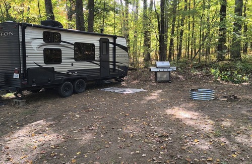 Grayling House | A well-maintained, cozy camper in a secluded location near state land