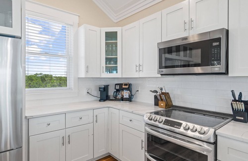 Plantation House | Acacia: Stunning Beachfront Home, Private Pool, Pet-Friendly, Hot Tub, Sleeps 26