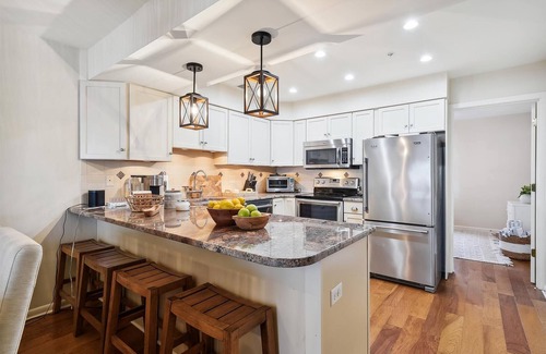 Bethany Beach House | Activities included up to $300 FREE PER WEEK! NEW LISTING 2024! Beautifully decorated vacation townhome in North Bethany approximately 300 feet from the beach and nestled behind the dunes with a private boardwalk taking you out to the surf and sand!