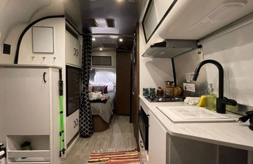 Eureka Springs RV Rental | Airstream with Hot Tub and Sunset Deck at Loblolly P
