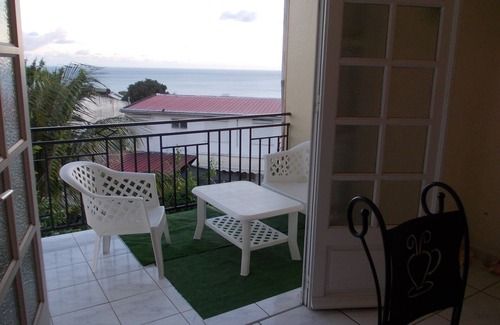 Schoelcher Apartment | ALL COMFORT and BRIGHT, first floor of a villa, BALCONY, VIEW of the Caribbean SEA