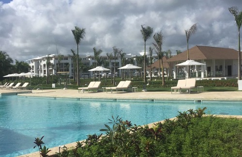 Punta Cana Apartment | Alll inclusive 4 stars resorts walking distance to the beach fine dining