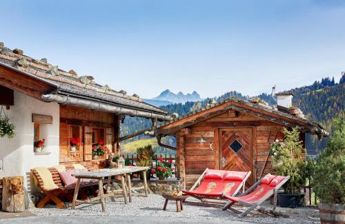 Hundsdorfl Ski Chalet | Almdorf Flachau - Luxus Hüttenurlaub