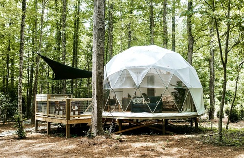 Pittman Center RV Rental | Amazing Creekside Glamping Dome in Park-Like Setting with Hot Tub & A/C!